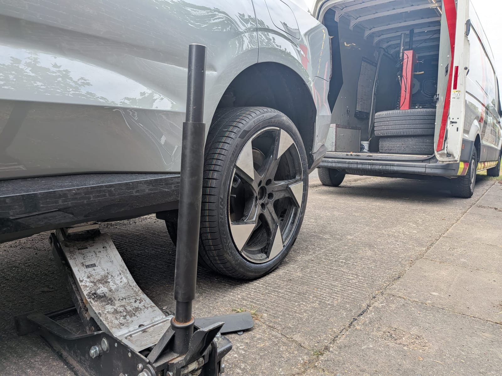 Tyre being changed at the roadside next to the Tyre Emergency Ltd service van